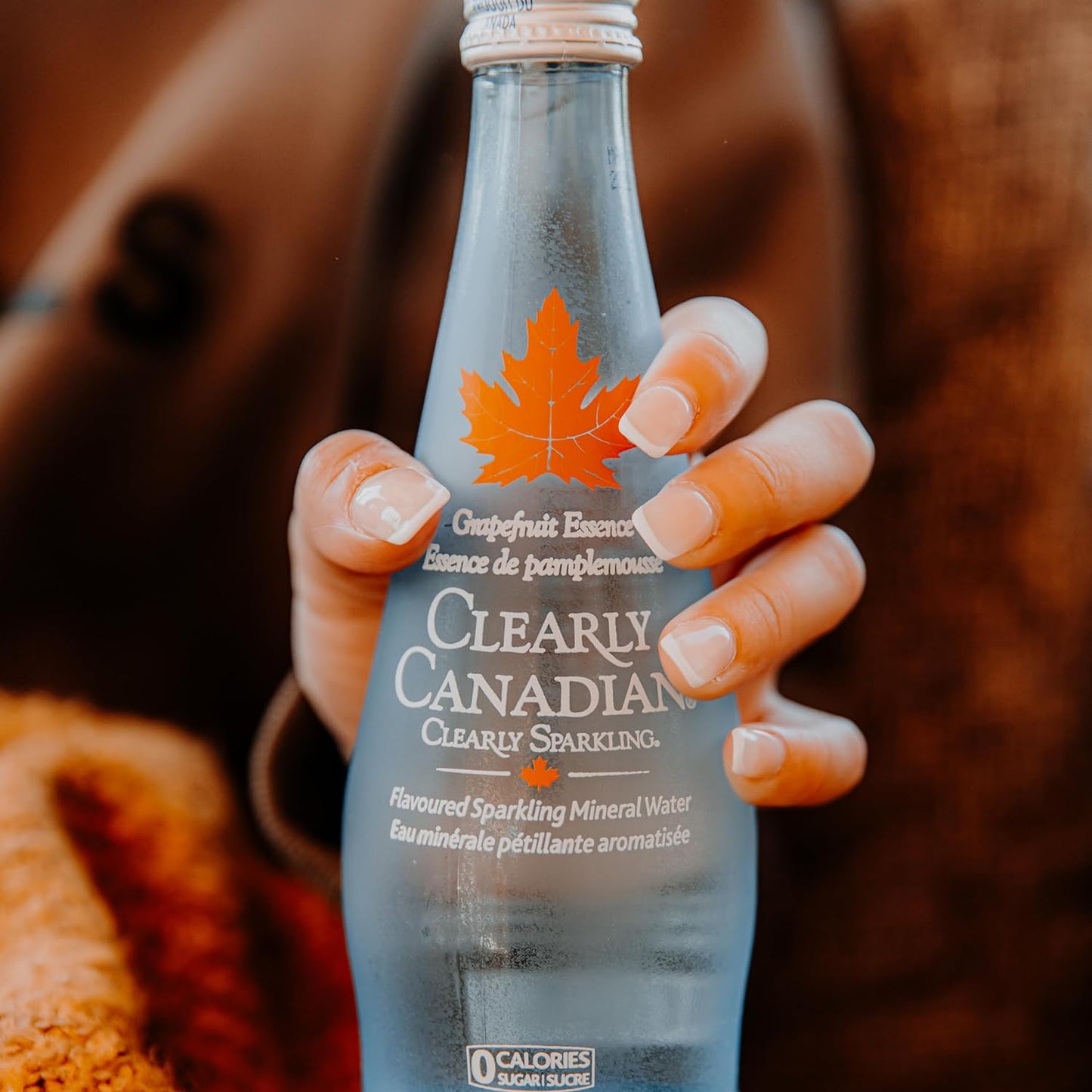 Clearly Canadian Clearly Sparkling Grapefruit Essence Unsweetened Flavored Sparkling Mineral Water, Zero Sugar & Zero Calories, 1 Case (12 Bottles x 325mL)